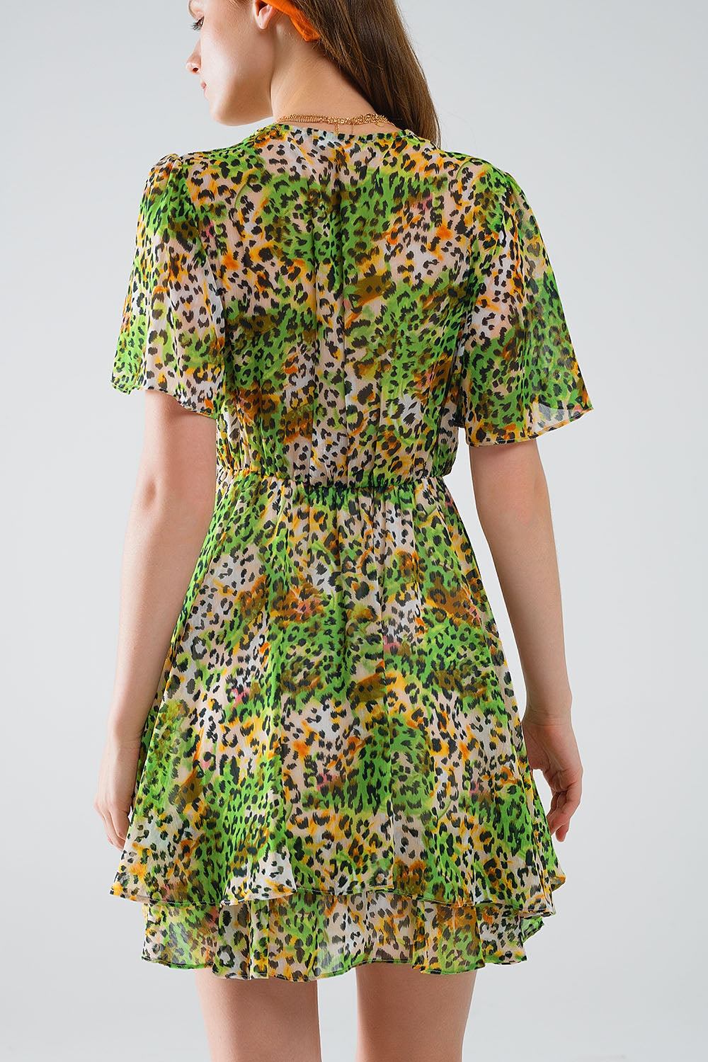 Abito corto verde multicolore con top incrociato con stampa animalier